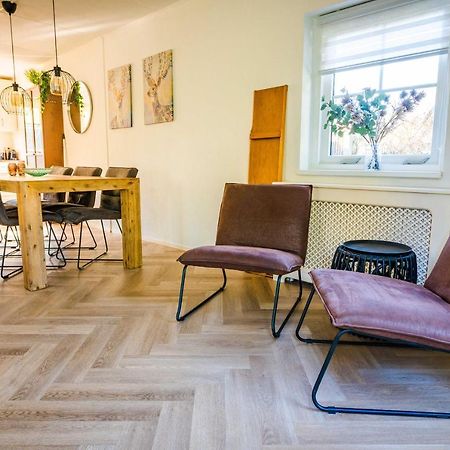 Luxe Vakantiehuis In Het Bos Met Jacuzzi En Sauna 卢特伦 外观 照片