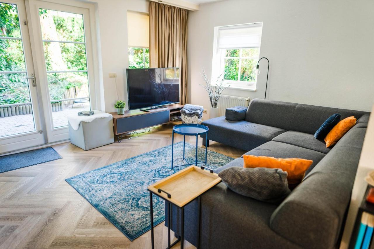 Luxe Vakantiehuis In Het Bos Met Jacuzzi En Sauna 卢特伦 外观 照片